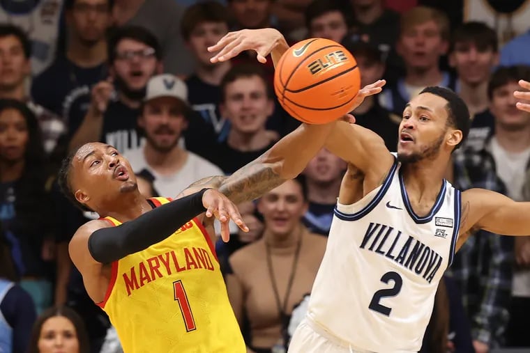Villanova's Mark Armstrong fights for the ball with Maryland's Jahmir Young on Nov. 17.