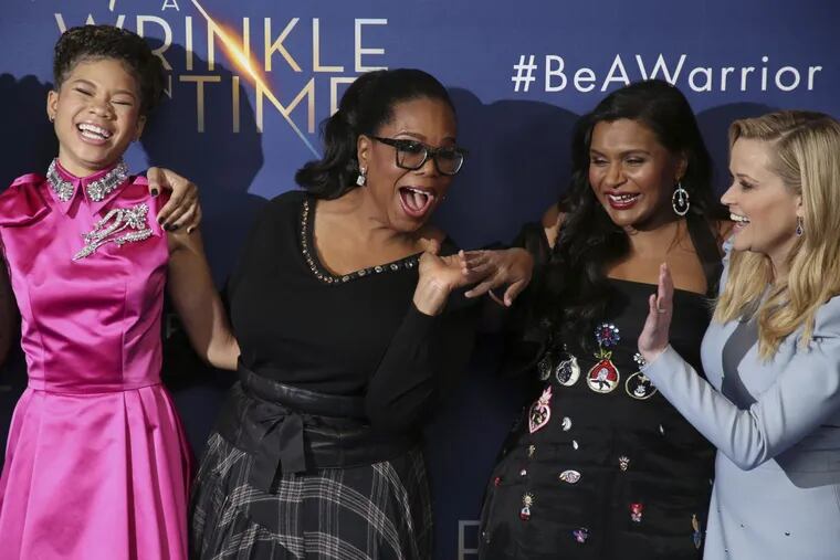 Actresses Storm Reid,  Oprah Winfrey, Mindy Kaling and Reese Witherspoon pose for photographers  at the recent London premiere of the film adaptation of  “A Wrinkle In Time” — a story with lots of strong women.