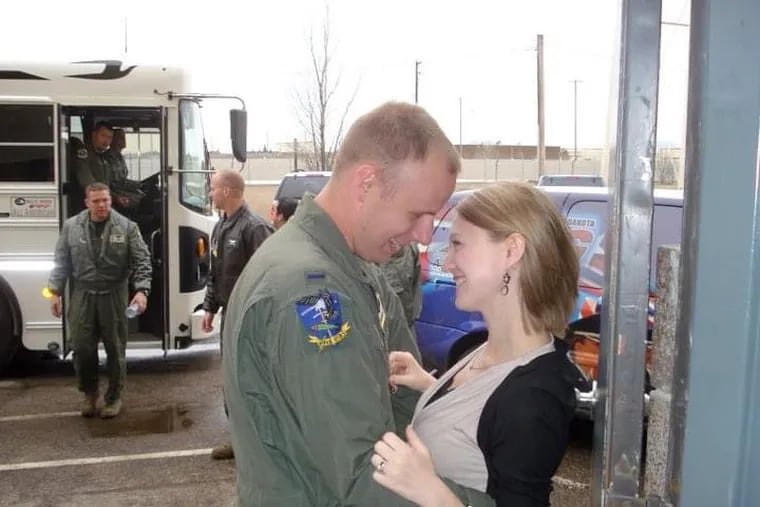 Micah Brown reunites with his wife after his first deployment in 2011. Sacrificing time with family is what true leadership looks like, writes Brown.