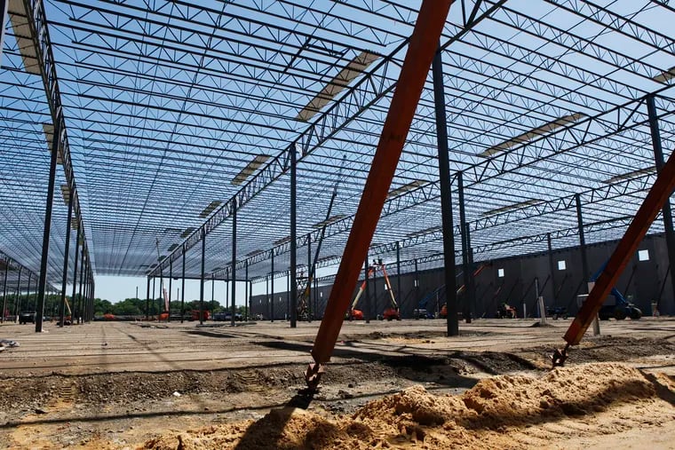 Construction continues on the new one million square foot Amazon distribution center in Burlington, NJ, . The site was formerly the shuttered U.S. Pipe factory. Construction on the Amazon warehouse should finish by the end of the year.