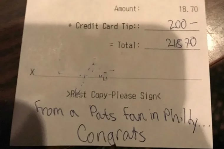 Copy of credit-card slip left at the Happy Rooster by a big-tipping New England Patriots fan. We have masked her name and signature.