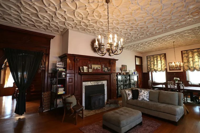 A view of the living and dining room on the 2nd floor of the Guckin Mansion and Funeral home. ( DAVID MAIALETTI / Staff Photographer )
