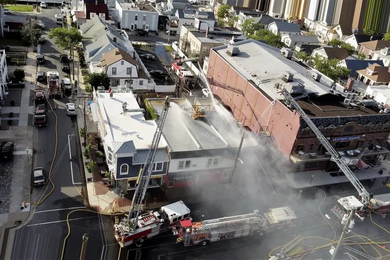 Aerial view of the three-alarm fire that damaged the building housing Sack O' Subs on Ventnor Avenue in Ventnor, N.J., on Saturday.