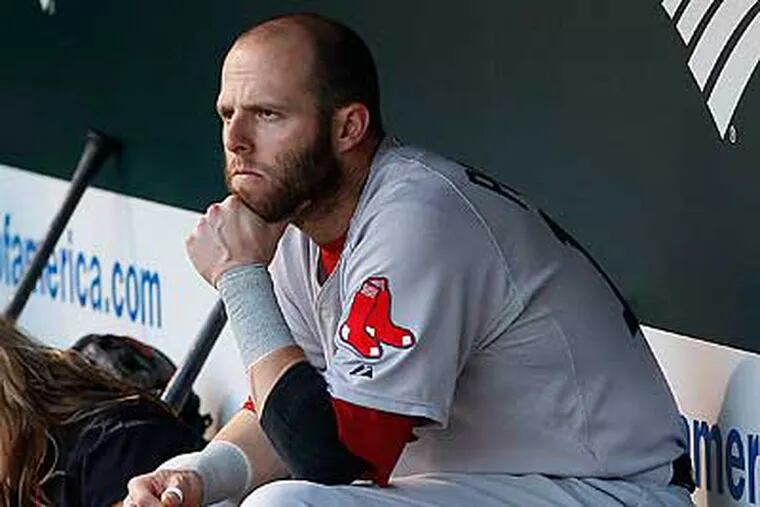 Dustin Pedroia and the Red Sox blew a late lead to the Orioles and were left out of the playoffs. (Patrick Semansky/AP)