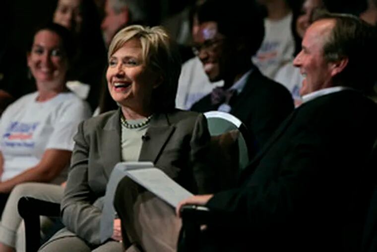 Some strategists say uncertainty over primaries helps national front-runners, Sen. Hillary Rodham Clinton - shown at a fund-raiser yesterday with author John Grisham - and Rudy Giuliani.
