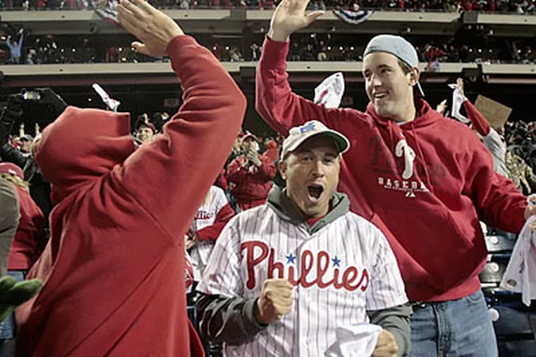 Phillies fans went from grief to disbelief when Jimmy Rollins got his game-winning hit in the bottom of the ninth inning. (Elizabeth Robertson/Staff Photographer)