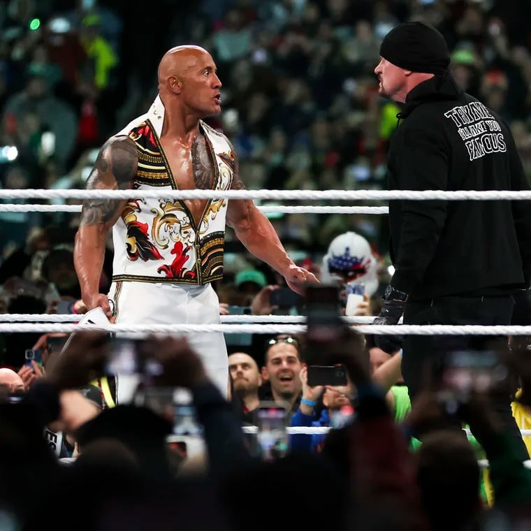 Dwayne "The Rock" Johnson gets a stare down from The Undertaker during a wild main event at WrestleMania 40 last month.