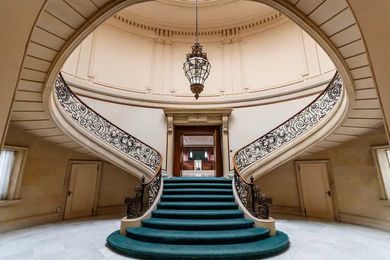 The staircase to the second floor in the Elsmore Manor at the Elkins Estate in Elkins Park. This Gilded Age estate was recently purchased by developers who say they want to turn the historic property into an upscale hotel and spa.