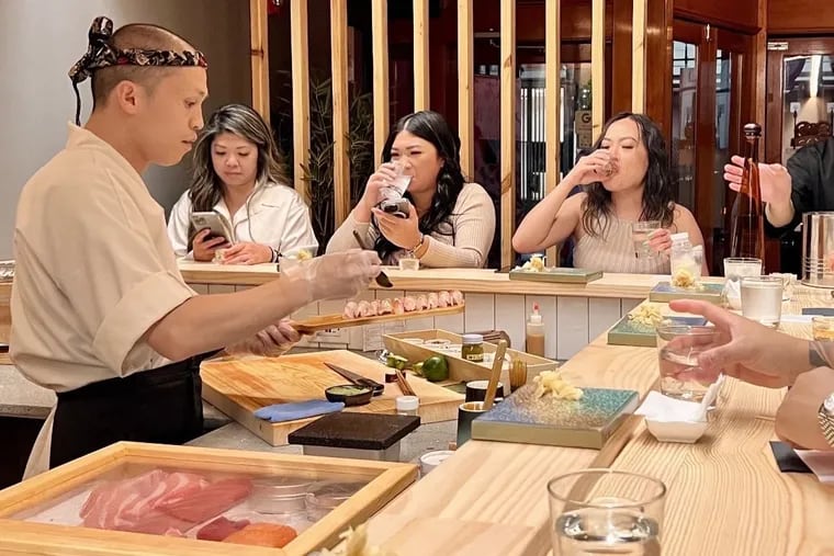 Sushi chef Alex Jiang puts together an omakase meal at Kichi Omakase, 112 S. 12th St.
