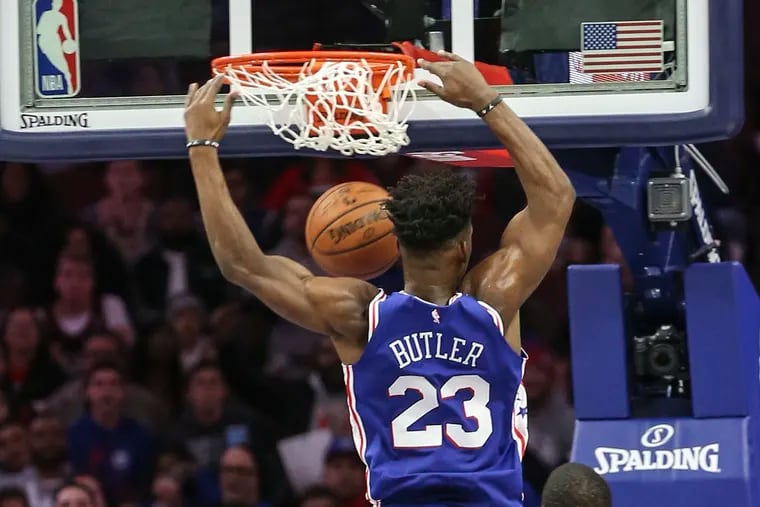 Sixers' Jimmy Butler dunks against the Suns during the 4th quarter at the Wells Fargo Center in Philadelphia, Monday, November 19, 2018. Sixers beat the Suns 119-114. STEVEN M. FALK / Staff Photographer