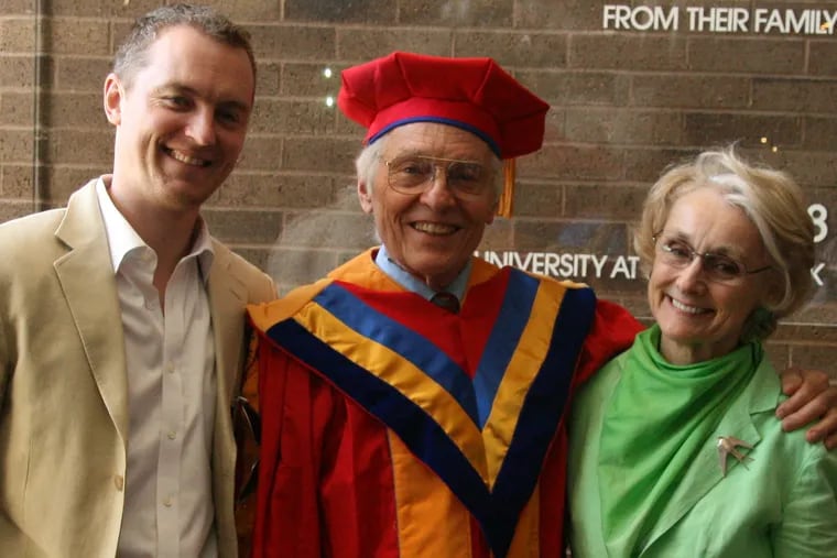 Dr. Wurster (center) stands with his son, Erik, and longtime partner, Marie Gladwish, in 2009 when he received an honorary doctorate of science from Stony Brook University.