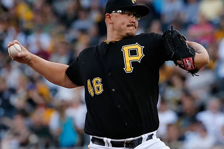 Pirates starting pitcher Vance Worley delivers during the first inning of a baseball game against the Arizona Diamondbacks in Pittsburgh, Thursday, July 3, 2014. (Gene J. Puskar/AP)