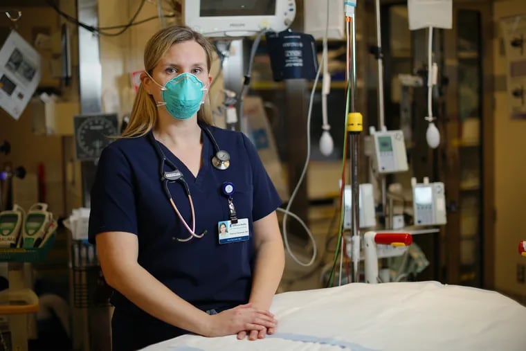 Patricia Henwood, an emergency medicine physician at Jefferson University Hospital, stands for a portrait in the hospital's trauma bay in Center City Philadelphia on Friday, March 5, 2021.
