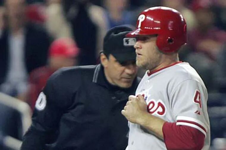 Eric Bruntlett scored the Phillies' only run of the game off Gregg Dobbs' ninth-inning pinch hit. (Lawrence Jackson/AP)