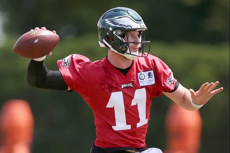 Eagles quarterback Carson Wentz throws a pass during the team's final day of organized team activities at the NovaCare Complex in South Philadelphia on Thursday, June 7, 2018. TIM TAI / Staff Photographer