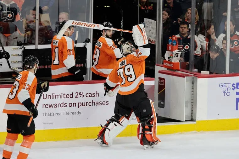 Flyers goalie Carter Hart slams his stick into the boards after the Flyers blew another late lead before losing in overtime to the Montreal Canadiens.