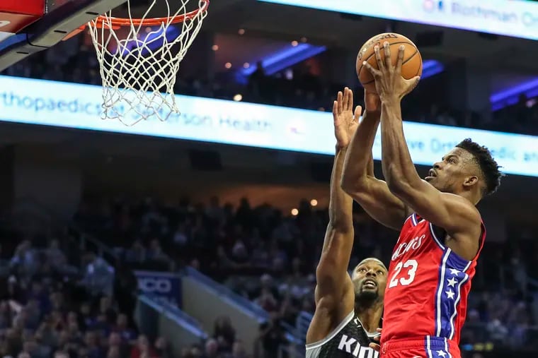 Sixers forward Jimmy Butler goes up for a shot in the first quarter of a game against the Sacramento Kings at the Wells Fargo Center in Philadelphia on Friday.