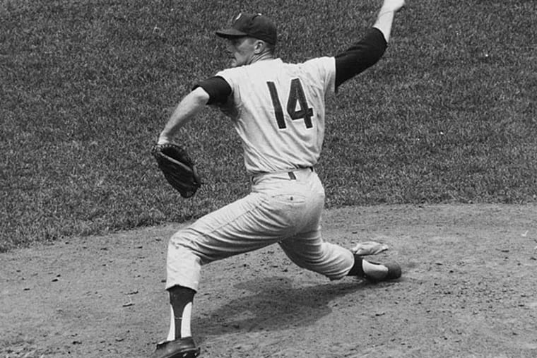 Jim Bunning of the Philadelphia Phillies pitches a perfect game against the New York Mets at Shea Stadium in New York. The Phillies beat the Mets, 6-0. Bunning retired all 27 batters who faced him in the first game of a doubleheader to become the first pitcher in 42 years with a perfect game in regular season play. (AP Photo/File)