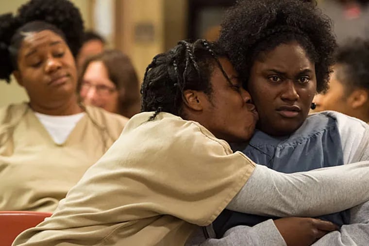 Uzo Aduba and Danielle Brooks in season 3 of Netflix's "Orange is the New Black." (JoJo Whilden/Netflix/TNS)