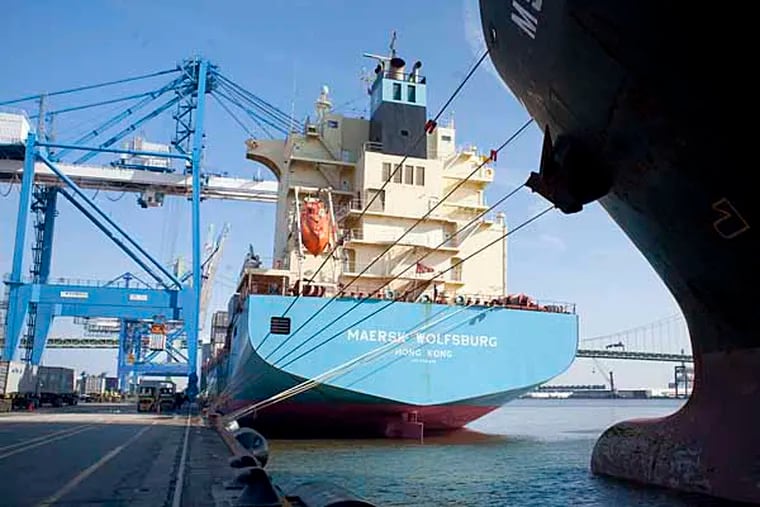 Docked at the Packer Avenue MarineTerminal, the Maersk Wolfsburg, a cargo ship,  is loaded with a new shipment of  containers. (Ed Hille / Staff Photographer)
