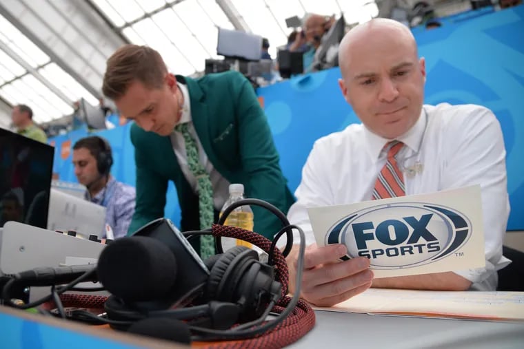 Fox Sports World Cup broadcasters John Strong (right) and Stuart Holden (center) with producer Shaw Brown right), preparing for one of their game calls at the 2018 World Cup in Russia.