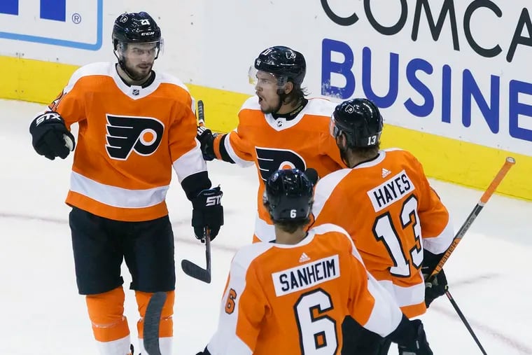 Scott Laughton, left, was benched earlier in the series.