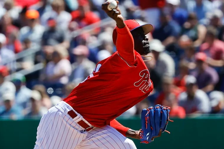 Phillies pitcher Yunior Marte throws the baseball in the third inning during a spring training game.