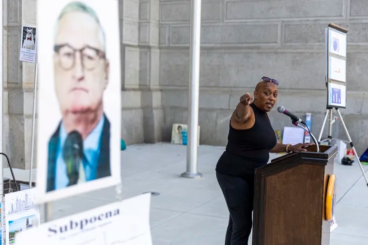 Tonya Bah, an activist with Philadelphia Neighborhood Networks, criticizes Mayor Jim Kenney for declining to establish the Philadelphia Public Finance Authority, which City Council authorized in March.