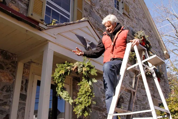 When using a ladder to decorate for the holidays, choose a warmer day and a sturdy ladder.