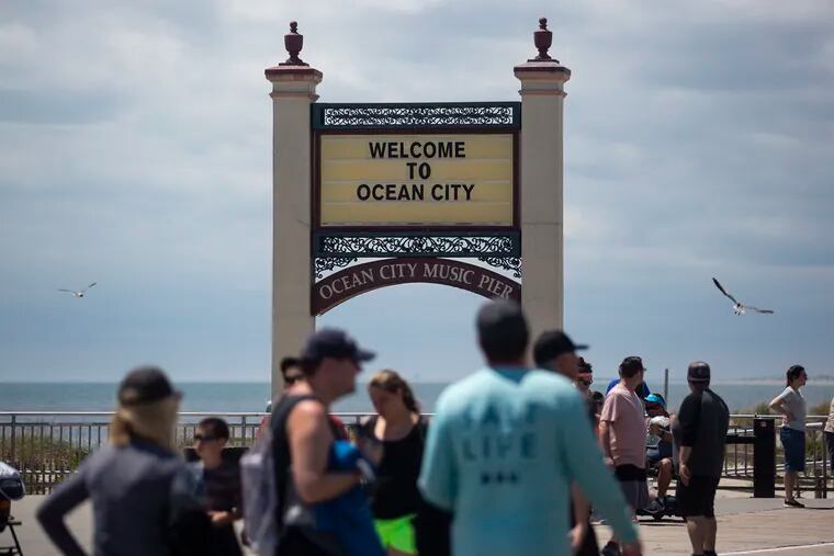 People fill the boardwalk in Ocean City while enjoying the weather and the beach on Saturday May, 16, 2020. Ocean City is one of few beaches doing a “dry run” to test “capacity management” this weekend in preparation for Memorial Day.