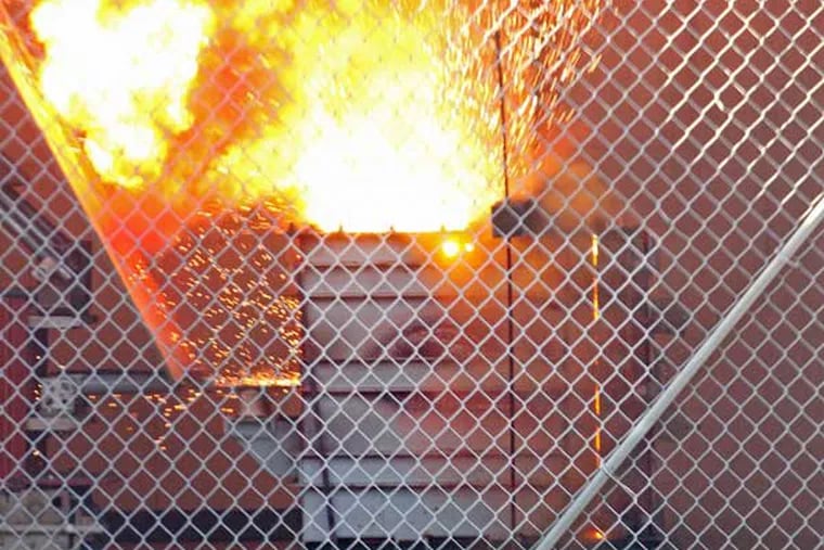An explosion and fireball at KEMA-Powertest lab in Chalfont, the largest independent highpower electrical-testing facility in America, is all in a day's work. (Michael Bryant / Staff Photographer)