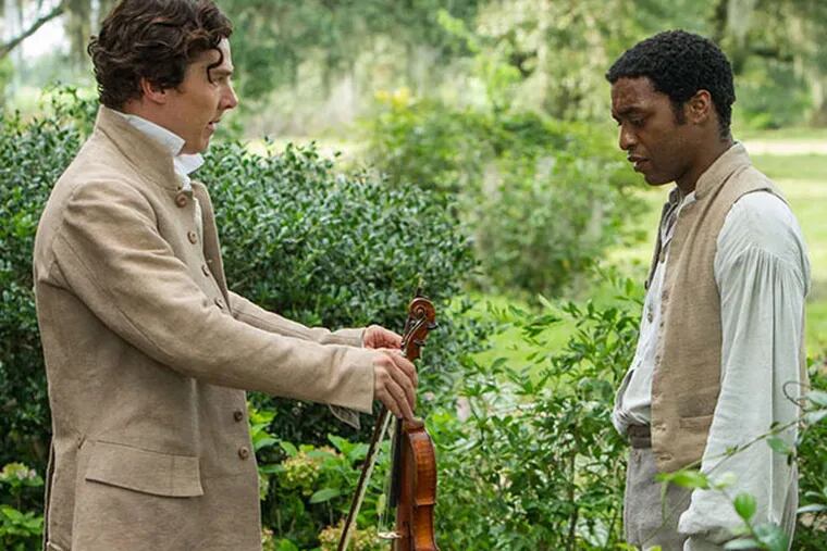 Benedict Cumberbatch, left, and Chiwetel Ejofor in a scene from "12 Years A Slave." (AP Photo/Fox Searchlight, Jaap Buitendijk)