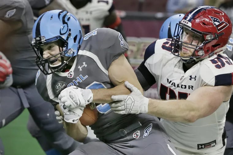 Aaron Wascha shaking loose of the Washington Valor's Jake Payne for a touchdown last month.