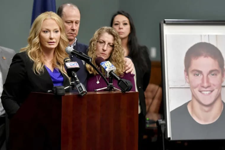 Jim and Evelyn Piazza stand by as Centre County District Attorney Stacy Parks Miller (left) announces the results of an investigation into the death of their son Timothy Piazza, seen in photo at right.
