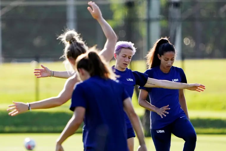 Megan Rapinoe (second  from right)  and teammates at a U.S. women's soccer team practice session on Saturday.
