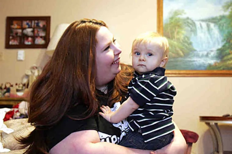 Lynn Heinisch, 31, and her son, Liam. Heinisch, of Croydon, said that if it weren't for informal breast-milk sharing, &quot;I don't know what would have happened to my son.&quot; (David Swanson/Staff)