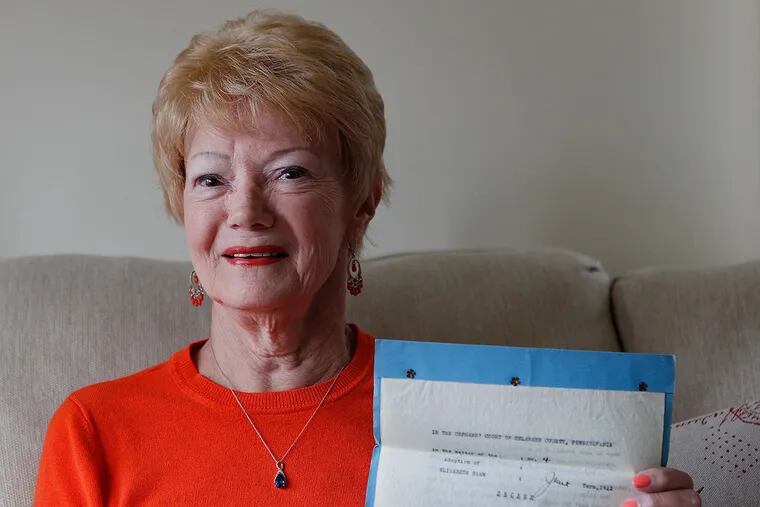 Pat Hohwald, 72, holds her adoption papers from 1942. She was adopted when she was a baby. ( MICHAEL S. WIRTZ / Staff Photographer ) April 18, 2014.