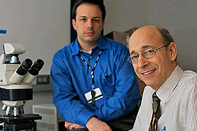 Benjamin Abella (left) and Lance Becker of the University of Pennsylvania are working on “therapeutic hypothermia,” or cold therapy. (John Costello / Inquirer)