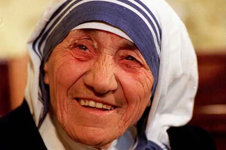 ** ADVANCE FOR FRIDAY AMS OCT. 17 **FILE**Mother Teresa smiles in London in this July 1993 file photo. As the Roman Catholic world prepares for her beatification on Oct. 19, 2003, Mother Teresa is remembered as a revered missionary to India's poorest of the poor, whose perpetual smile was as integral to her image as the weathered face and blue-trimmed robe. (AP Photo/Chris Bacon)