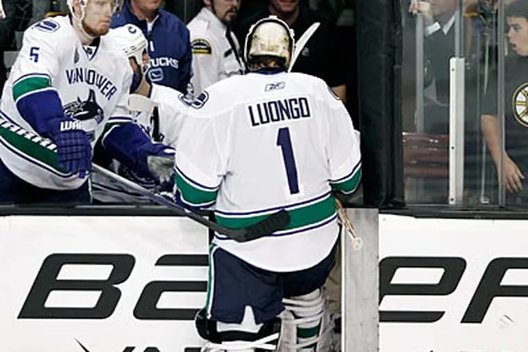 Roberto Luongo and the Canucks have lost two straight to the Bruins in the Stanley Cup Finals. (Winslow Townson/AP)