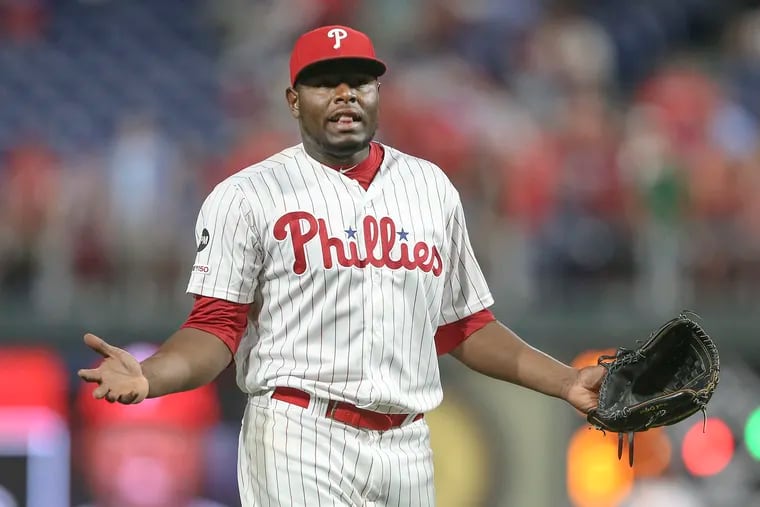 Hector Neris gestures after being ejected from Tuesday night's game.