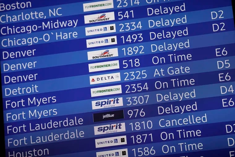 Snapshot of an arrivals screen at Philadelphia International Airport on Sunday.
