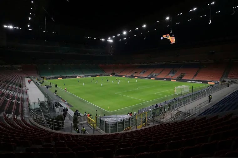 The seats are empty as a precaution against the coronavirus at the San Siro stadium in Milan, Italy.
