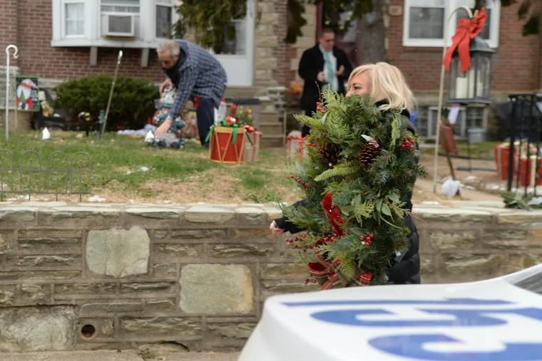 Carol Colantuono reclaimed a wreath of hers found in another woman’s house on the 3100 block of Brighton Street in Mayfair on Friday.