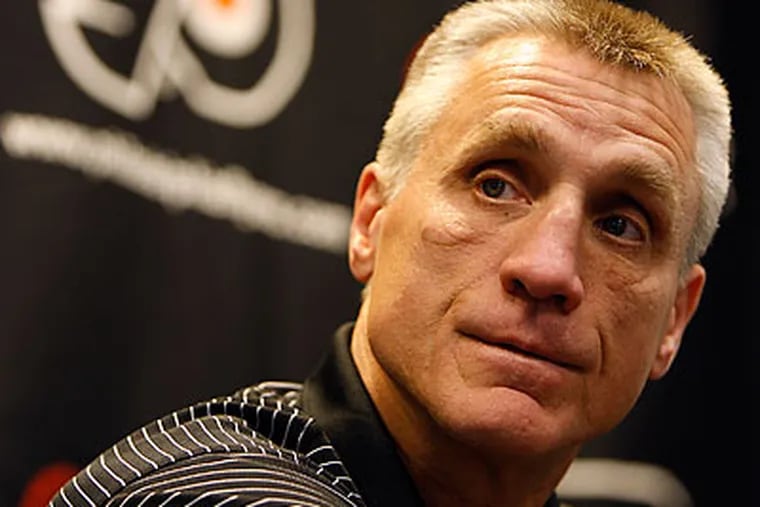 According to Comcast president Peter Luukko, Flyers' GM Paul Holmgren will be back next season.  (David Maialetti/Staff file photo)