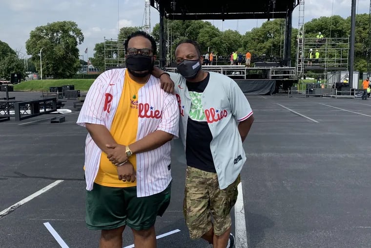 Cory Townes and his father, Jeff Townes, aka DJ Jazzy Jeff, in the Citizens Bank parking lot where Live-In Drive-In concerts are staged. The Towneses will perform together for the first time on Monday as part of the Labor Day Comedy Jam.