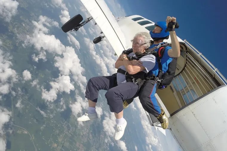 Betty Diem, 84, fulfills a wish on her “bucket list” by skydiving on Monday July 10, 2017, in Perkasie, Pa. Wesley Enhanced Living friend Frances Lock, 85, jumped too.