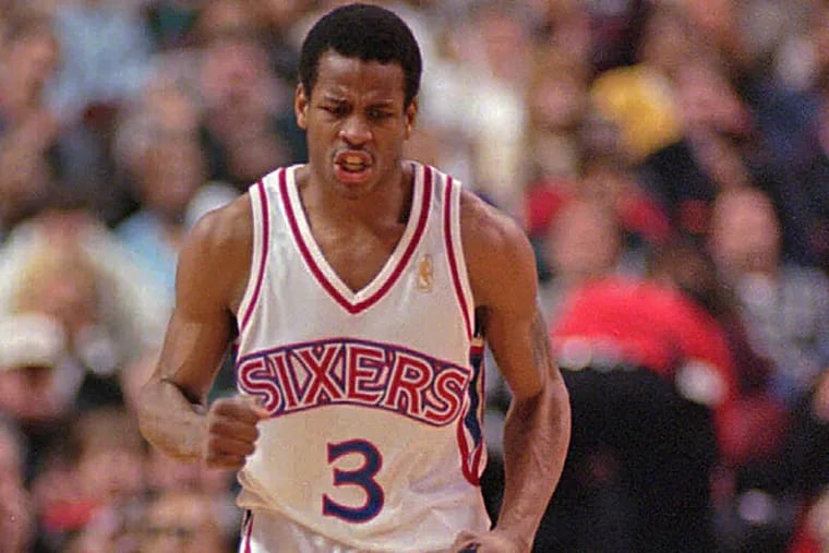 FILE -- Philadelphia 76ers' Allen Iverson reacts after scoring a basket during the first half against the Chicago Bulls Wednesday, March 12, 1997, in Philadelphia. Iverson scored 37 points. (AP Photo/Chris Gardner)