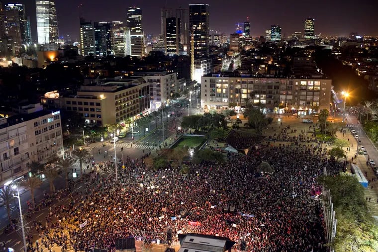 A general view of protest against violence against women in Tel Aviv, Israel, Tuesday, Dec. 4, 2018. A nationwide strike in protest of violence against women and commemorating the 24 victims of domestic violence with thousands of men and women calling on the government to take action against domestic abuse.