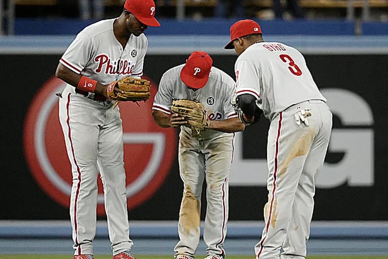 Phillies outfielders Domonic Brown, Ben Revere and Marlon Byrd. (Jae C. Hong/AP)
